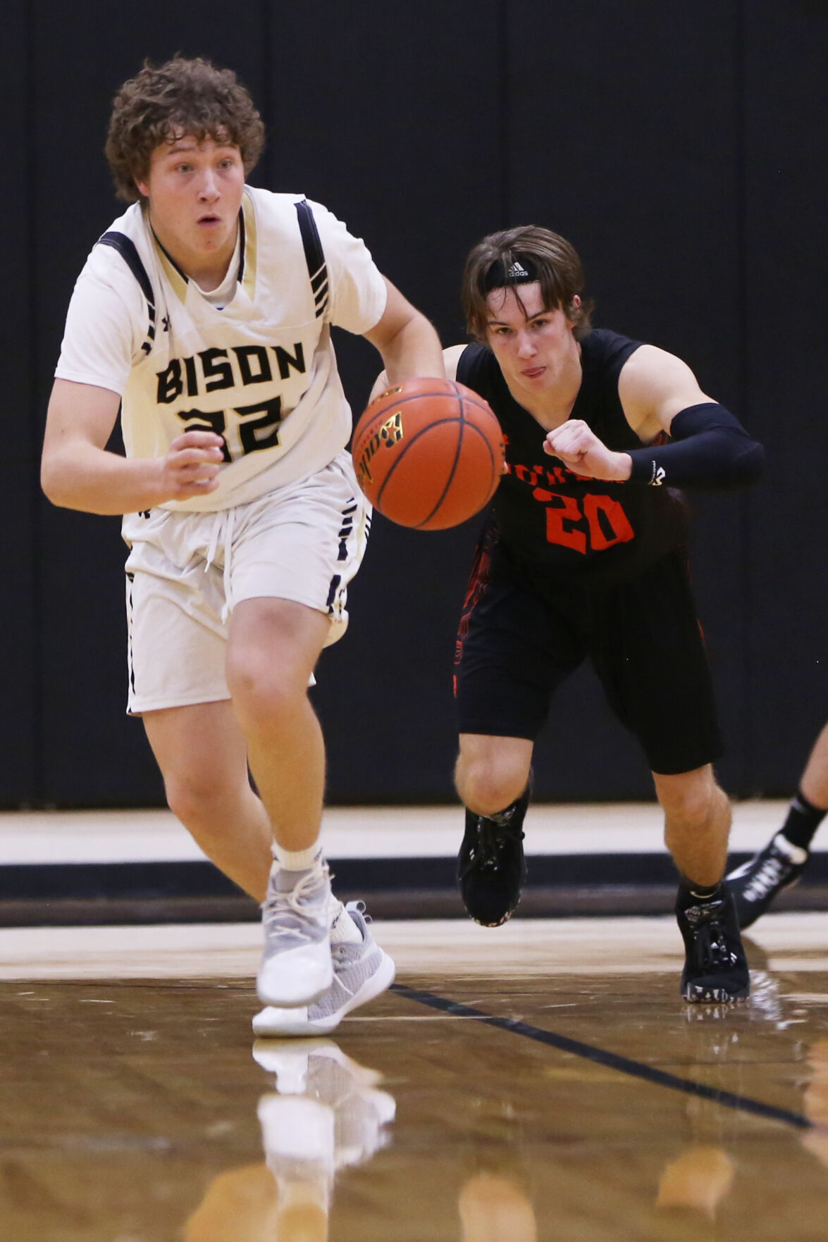 Calvin Rule drives the ball back down court